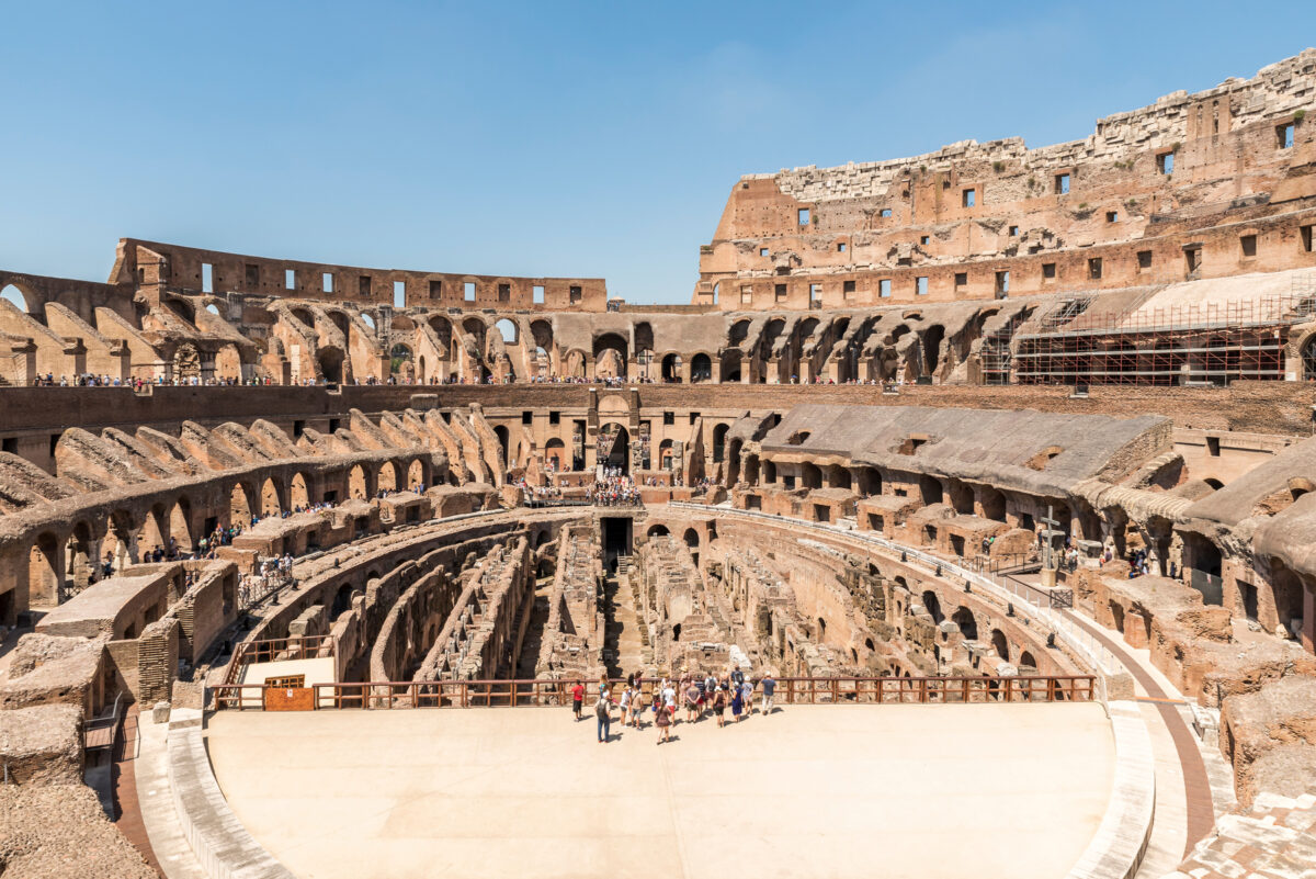 Interior view of Colosseum in a sunny day in Rome. The Colosseum is the most well-known landmark in Rome.